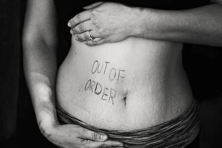 Canva-Out-of-Order-Text-on-Persons-Belly